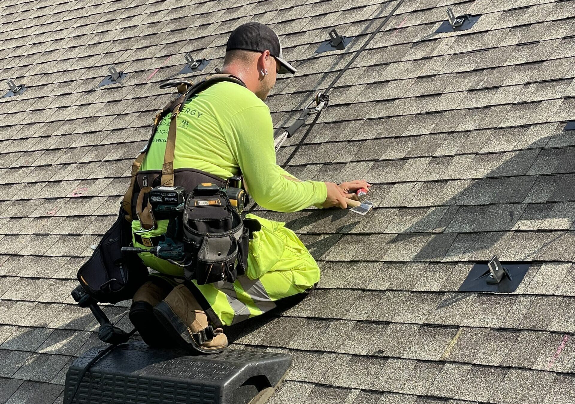 Solar technician on roof